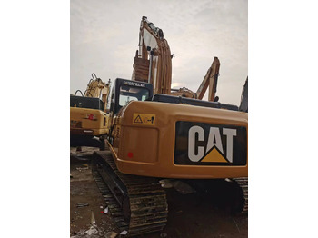 Kāpurķēžu ekskavators CATERPILLAR 323DL: foto 2