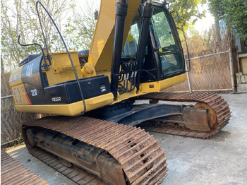 Kāpurķēžu ekskavators CATERPILLAR 323D