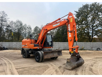 Riteņu ekskavators DOOSAN DX140W-3