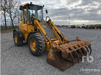 Riteņu iekrāvējs JCB 411: foto 4