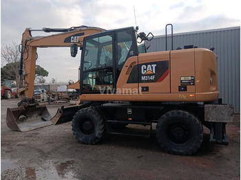 Riteņu ekskavators CATERPILLAR M314F