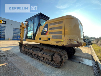 Kāpurķēžu ekskavators CATERPILLAR 323