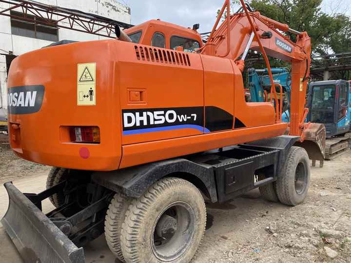 Kāpurķēžu ekskavators Doosan 150W-7 used wheel excavators Doosan 150W-7 secondhand machine for sale: foto 6